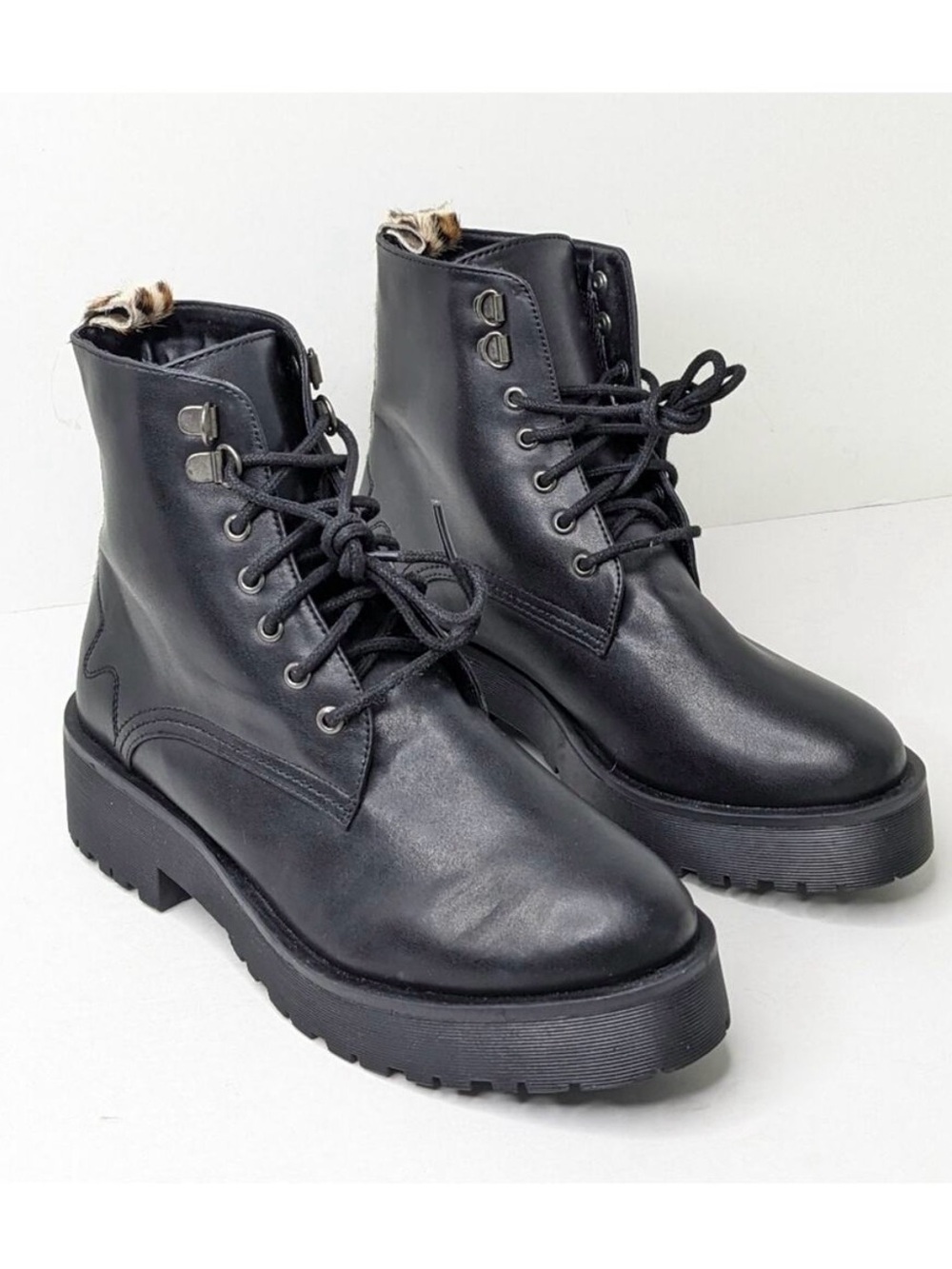 Secret Celebrity Black Faux Leather Leopard Calf Hair Lug Sole Combat Ankle Boot